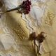 Tablecloth and 12 straw-colored napkins from the 50s.