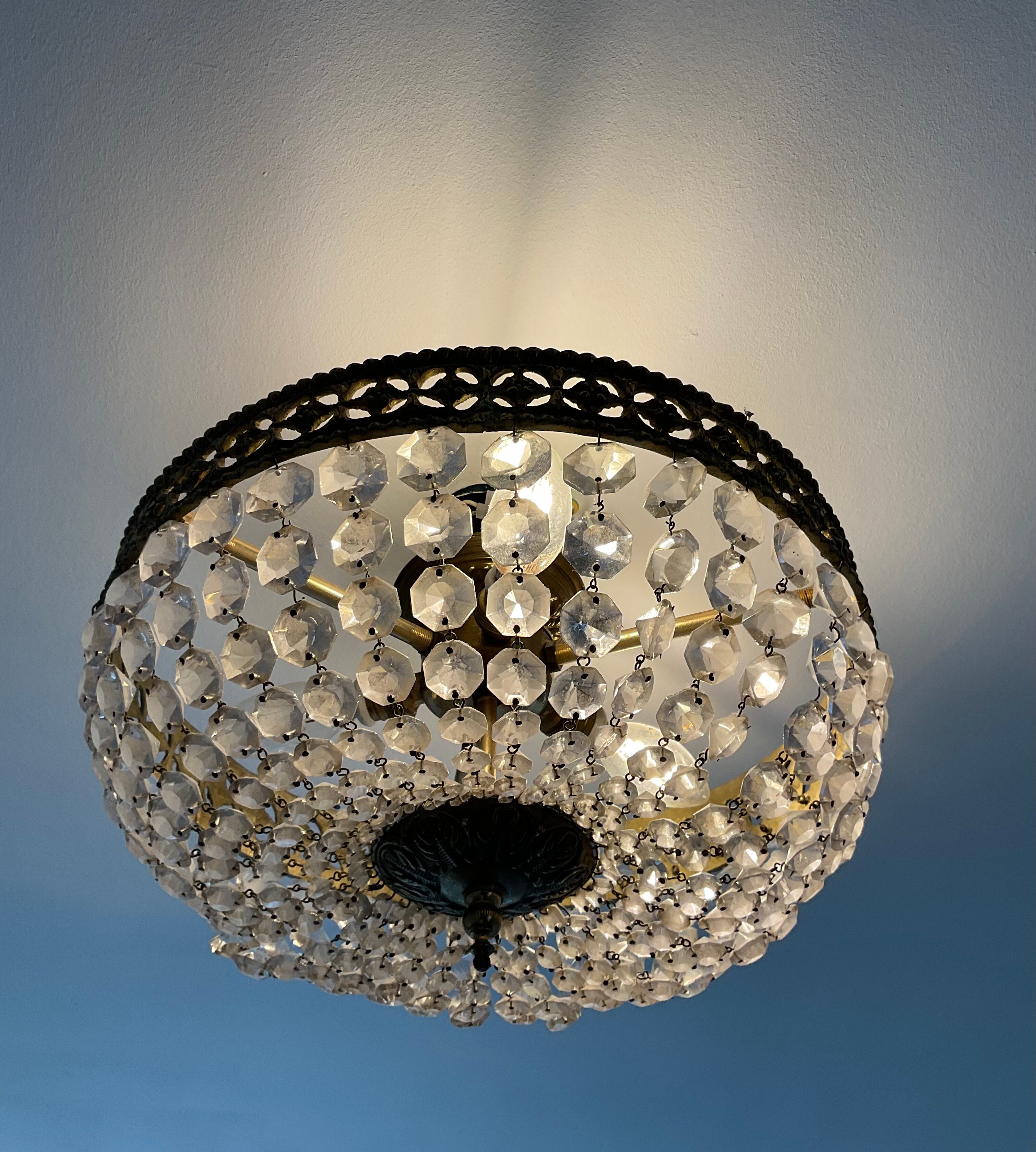 Old ceiling lamp basket with grapevines and bronze