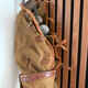 Old golf bag with 7 vintage clubs