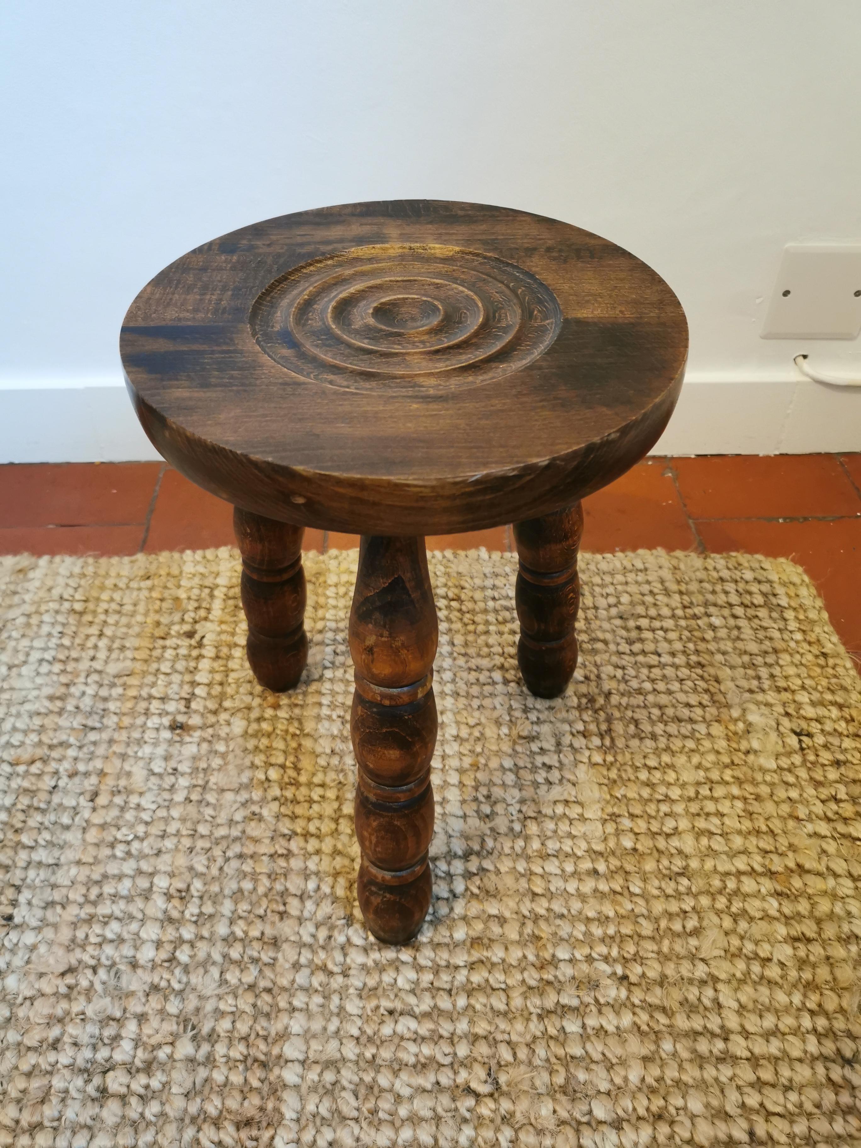 Wooden tripod stool
