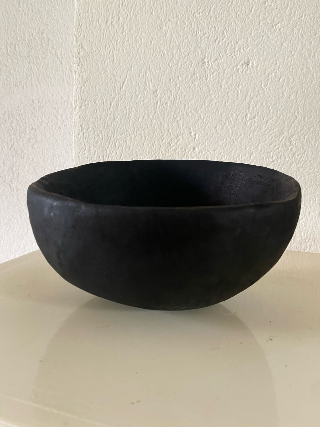 Black bowls made of néré wood