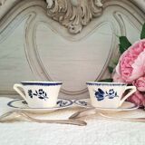 Antique cups with iron earthenware saucers