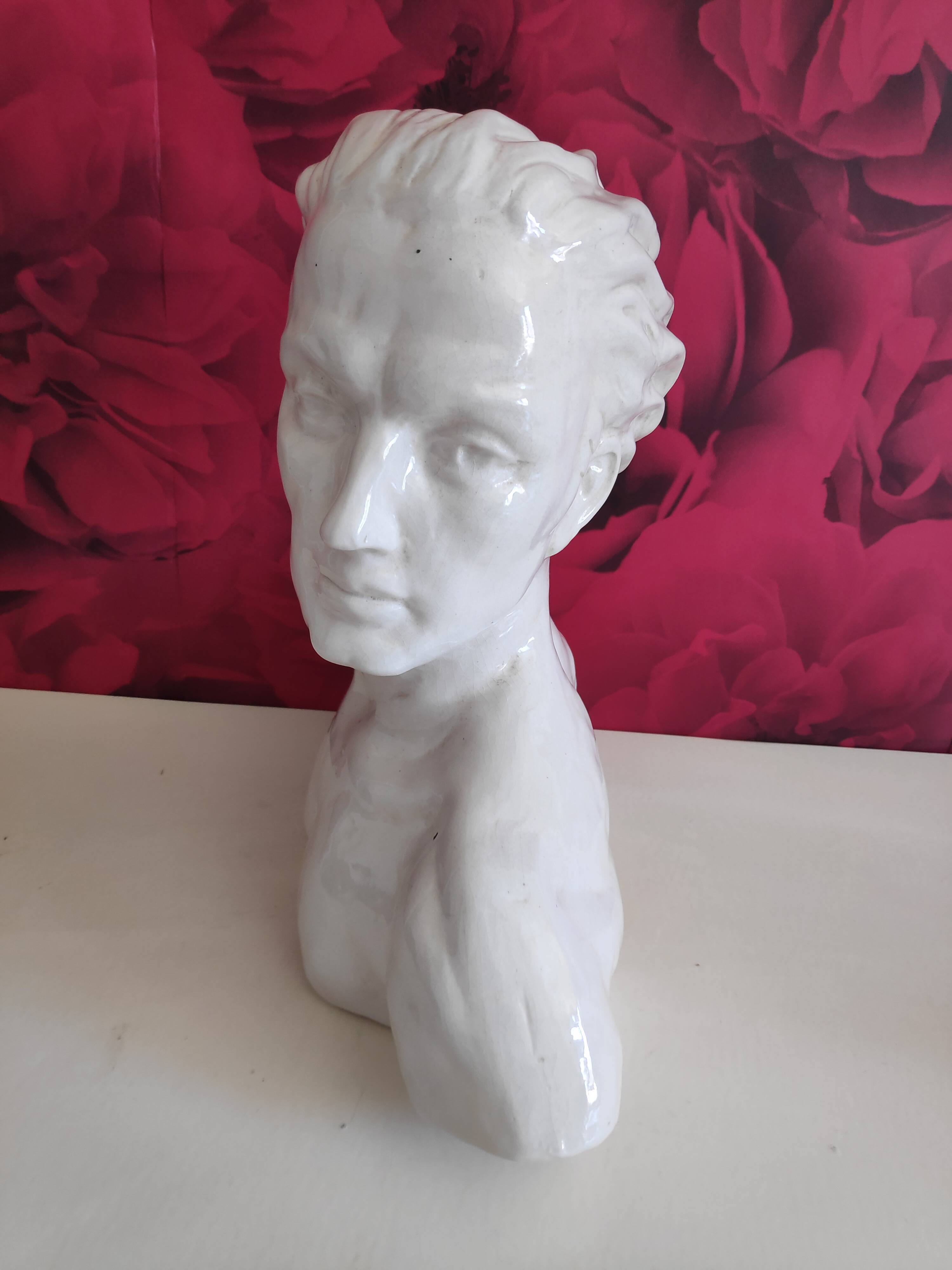 Bust of J. Mermoz in white cracked ceramic by H. Laurens