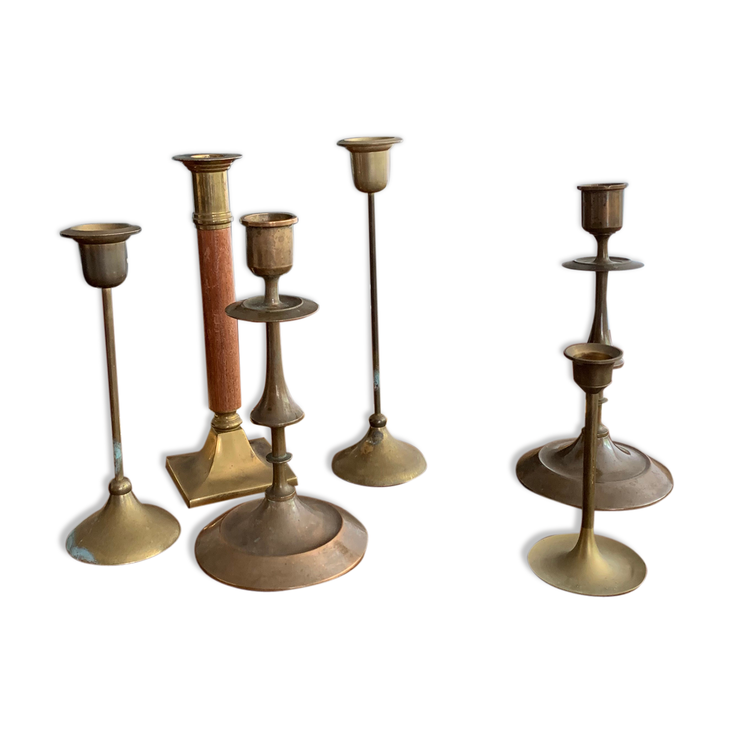 Set 7 mismatched brass and bronze candlesticks
