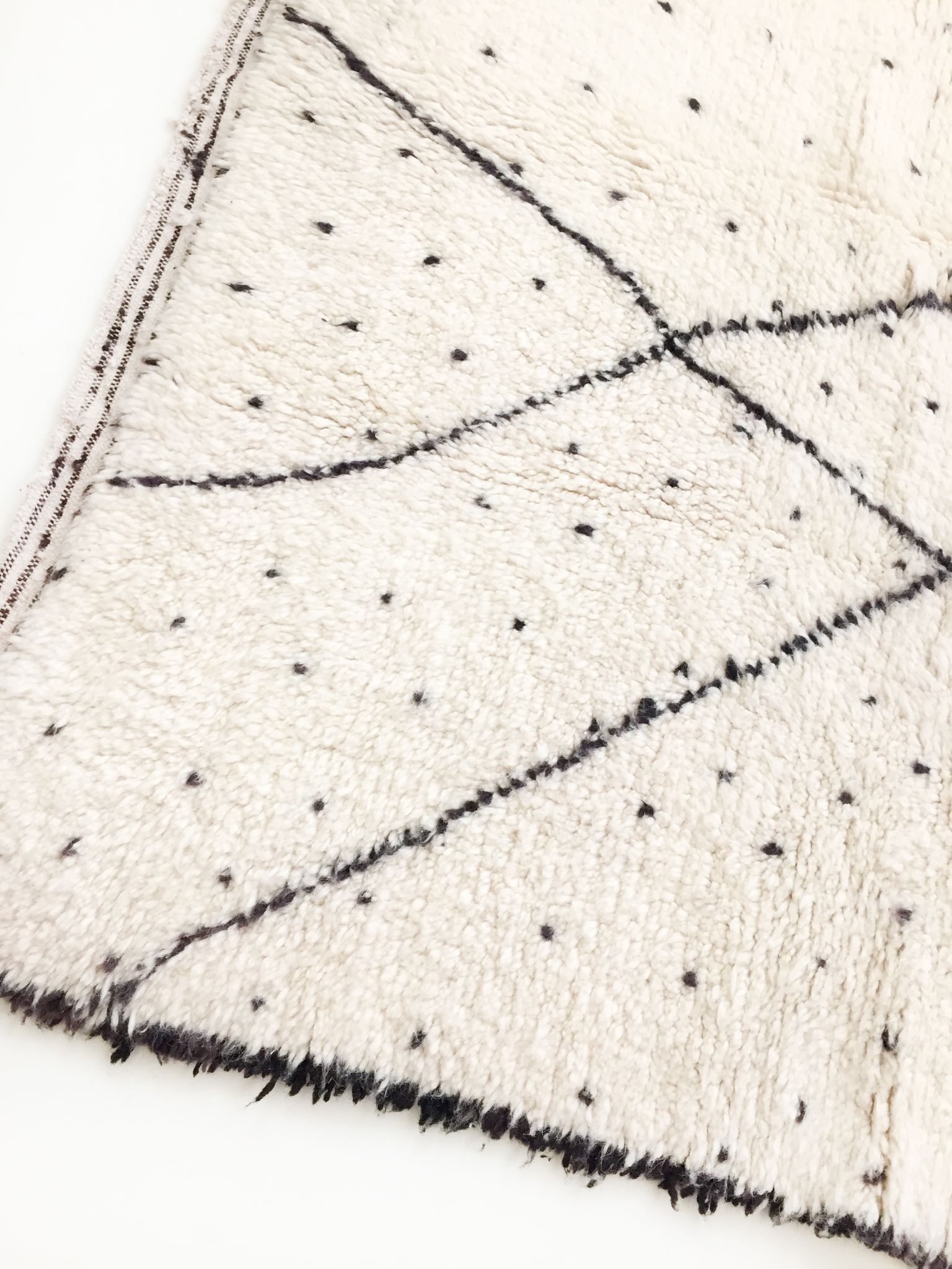 Beni Ouarain ecru Berber rug with polka dots and black patterns 235x157cm
