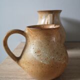 Lot of 4 pitchers in sandstone
