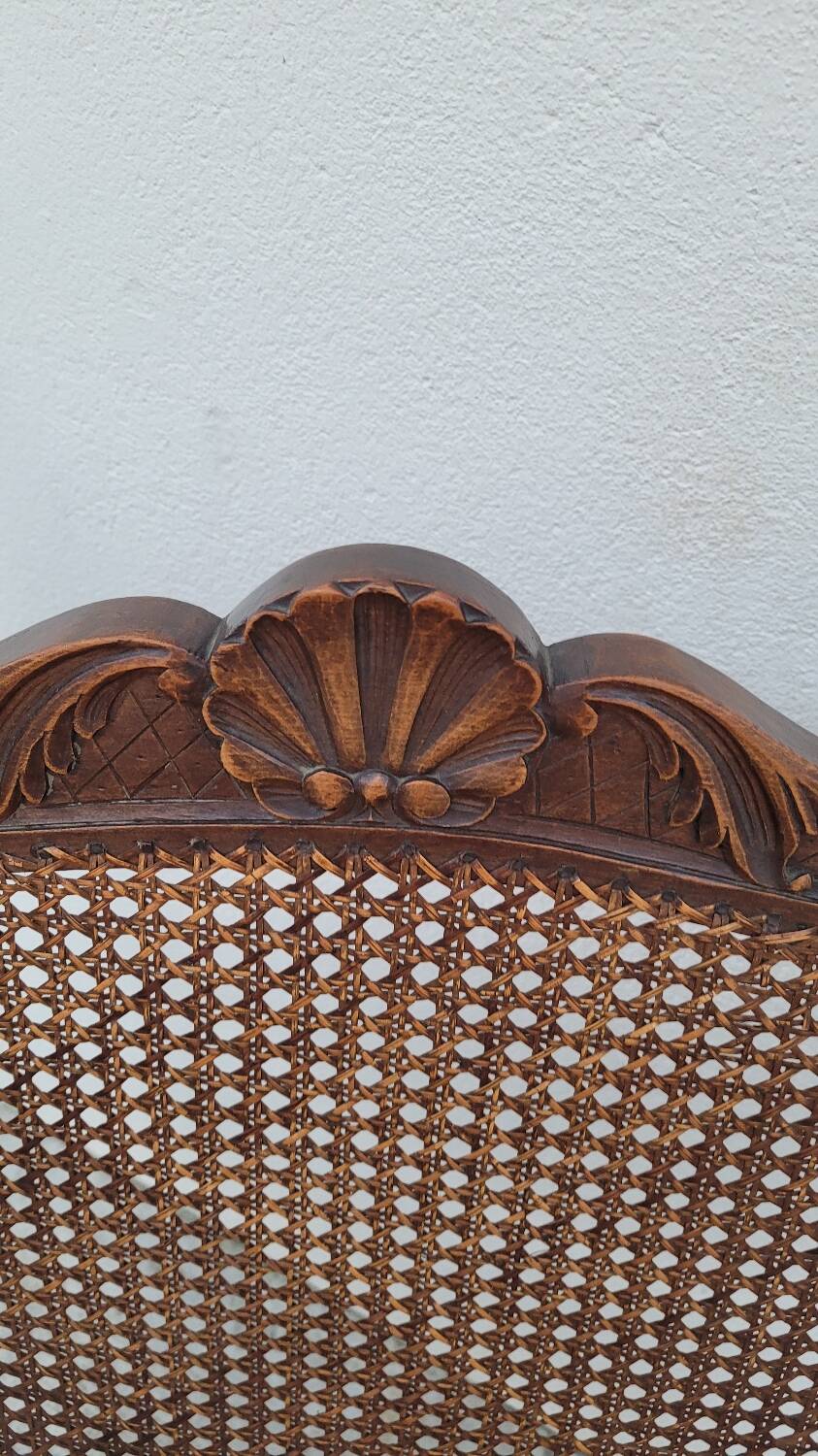 Louis XV Regency cane armchair leather armrests decorated with shell