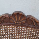 Louis XV Regency cane armchair leather armrests decorated with shell