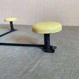 2 black and yellow metal wall coat racks