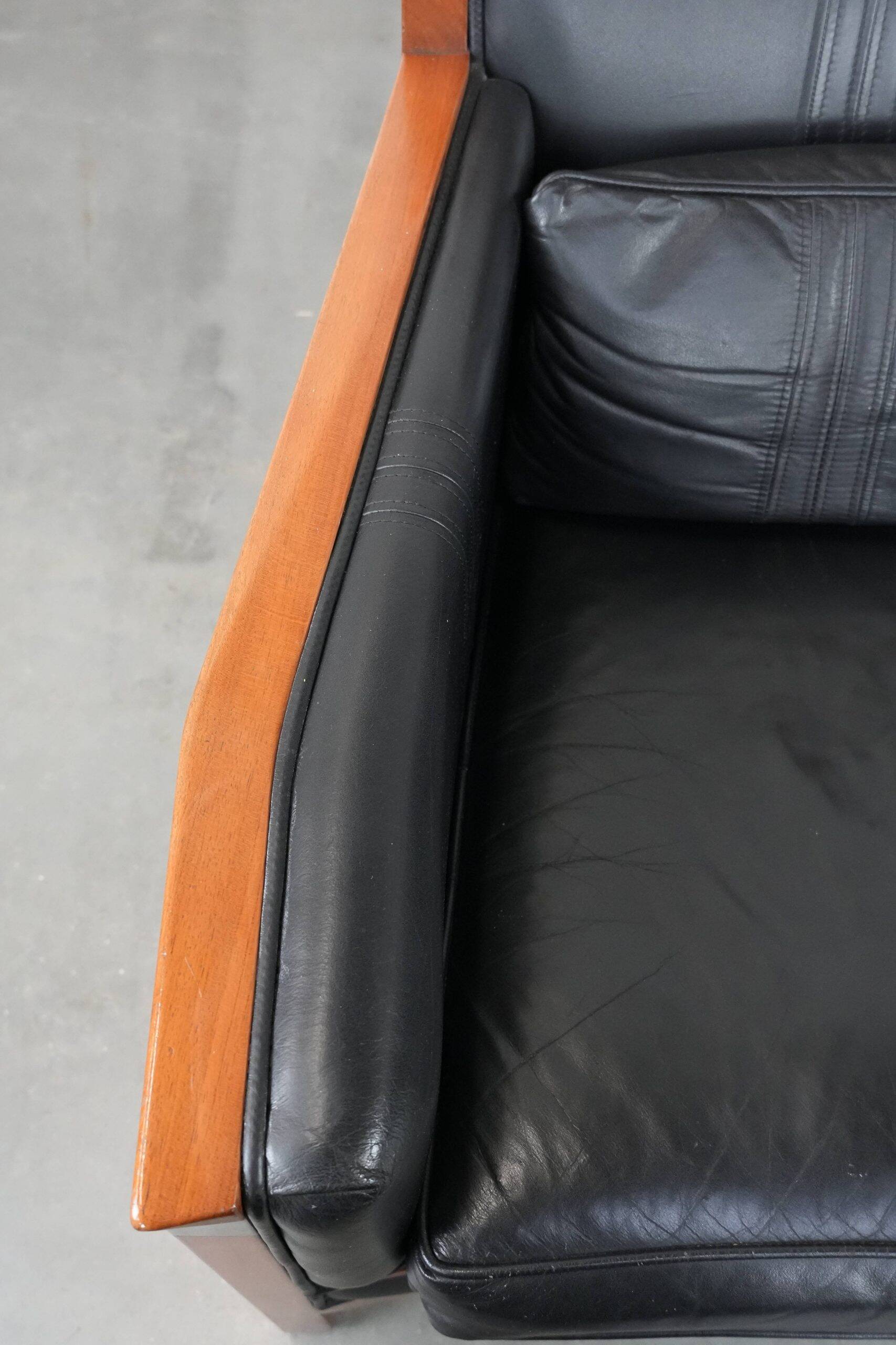 Set of  two black leather Art Deco design armchairs