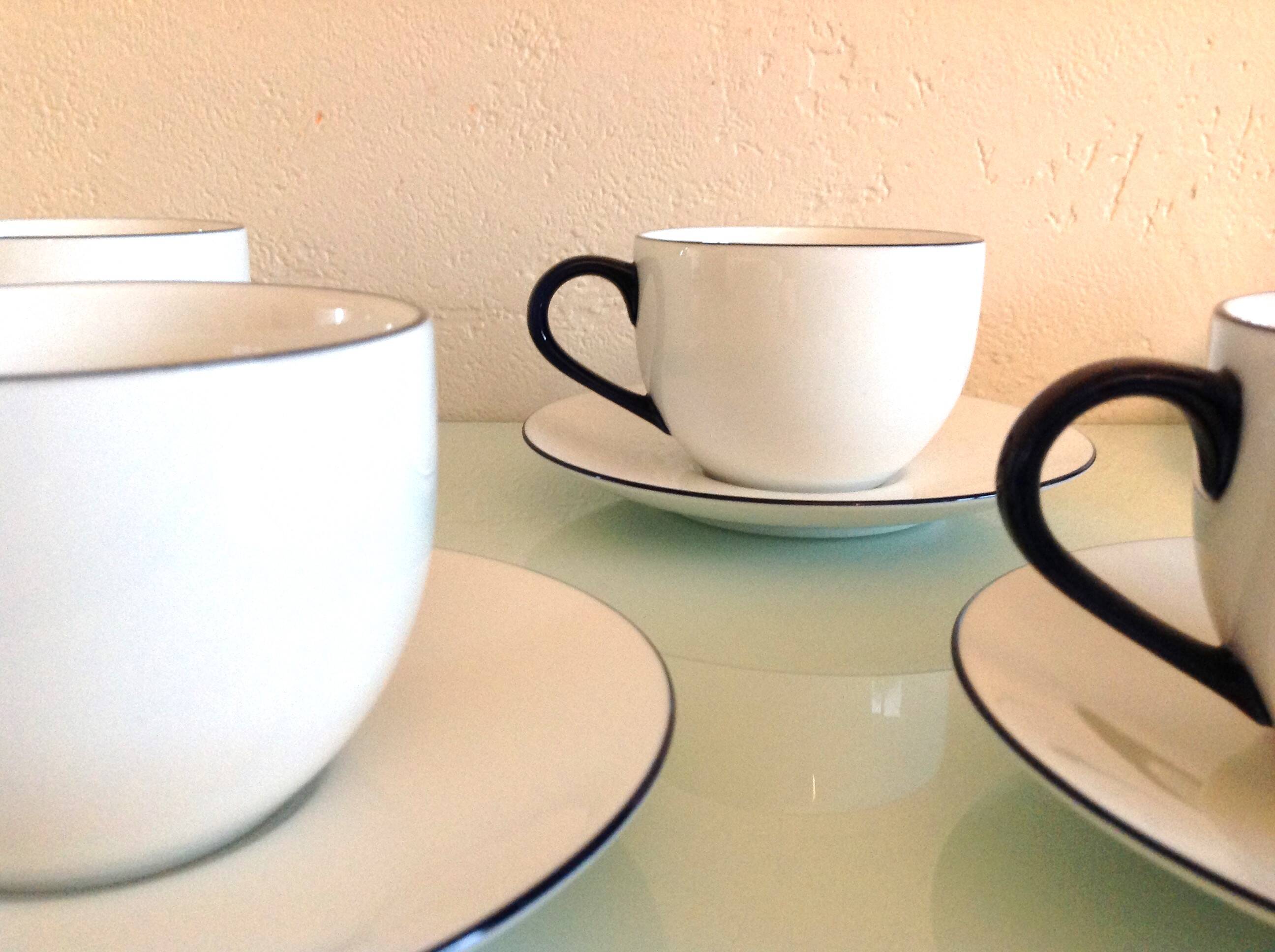 Set of eight white porcelain cups with blue edging / vintage 70s-80s