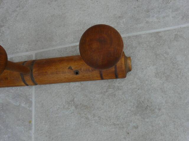 Wall-mounted coat rack made of turned wood imitating bamboo, 3 hooks.