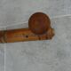 Wall-mounted coat rack made of turned wood imitating bamboo, 3 hooks.