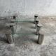 Pair of modernist coffee tables with cylindrical steel legs