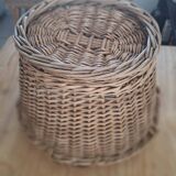 Old wicker basket with 3 handles.
