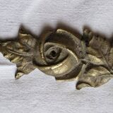 Old brass rose window, width 38cm.