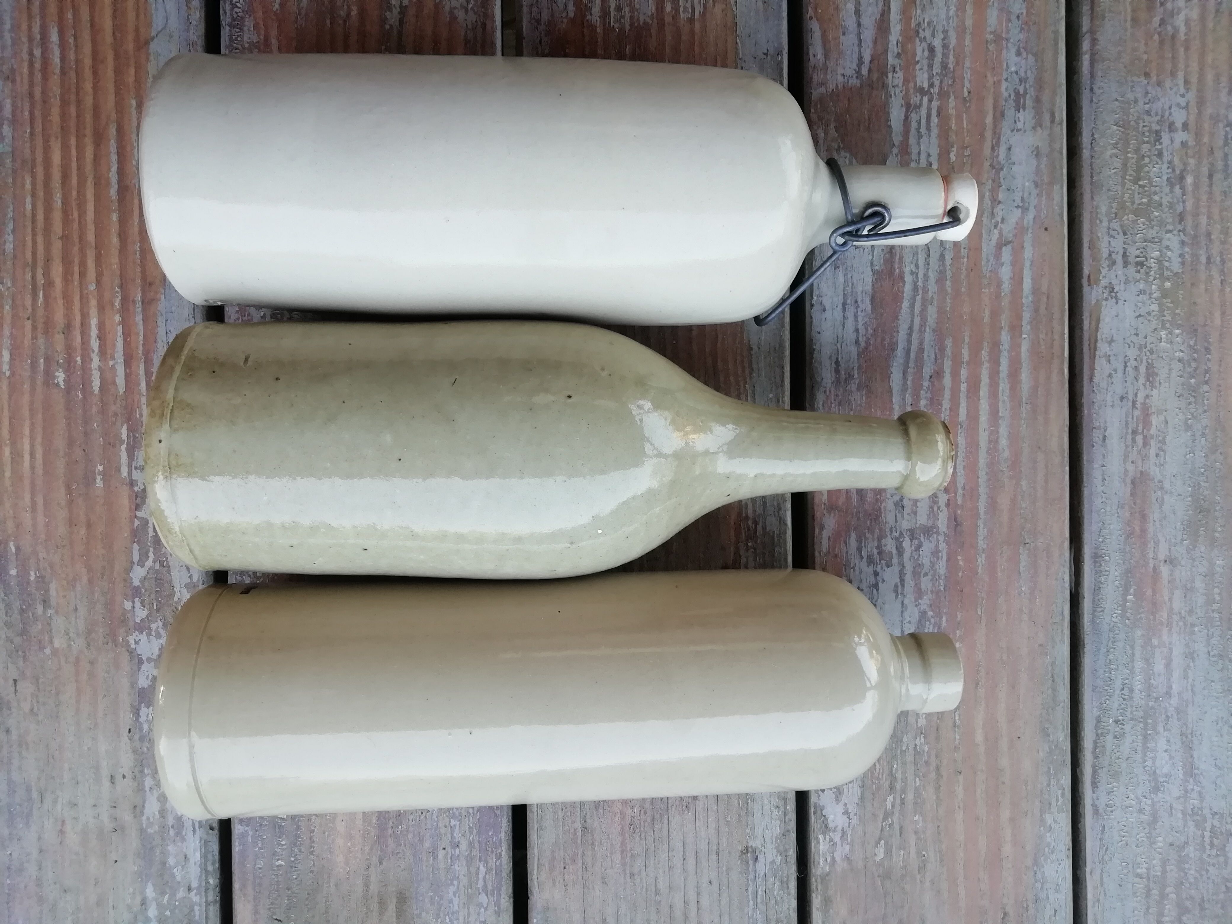 Trio of stoneware hot water bottles