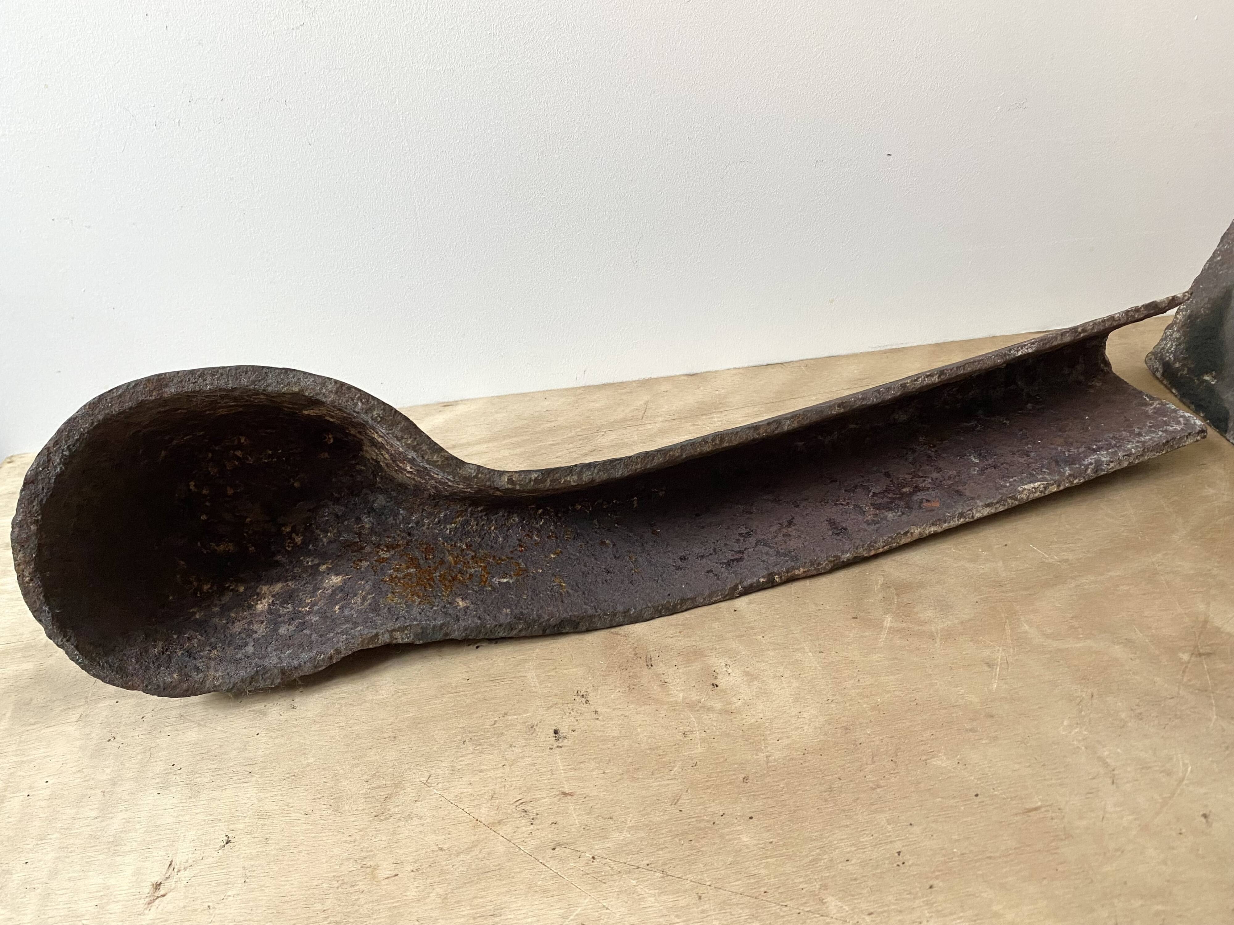 Pair of modernist anthropomorphic fireplace andirons, brutalist log holders 1950s