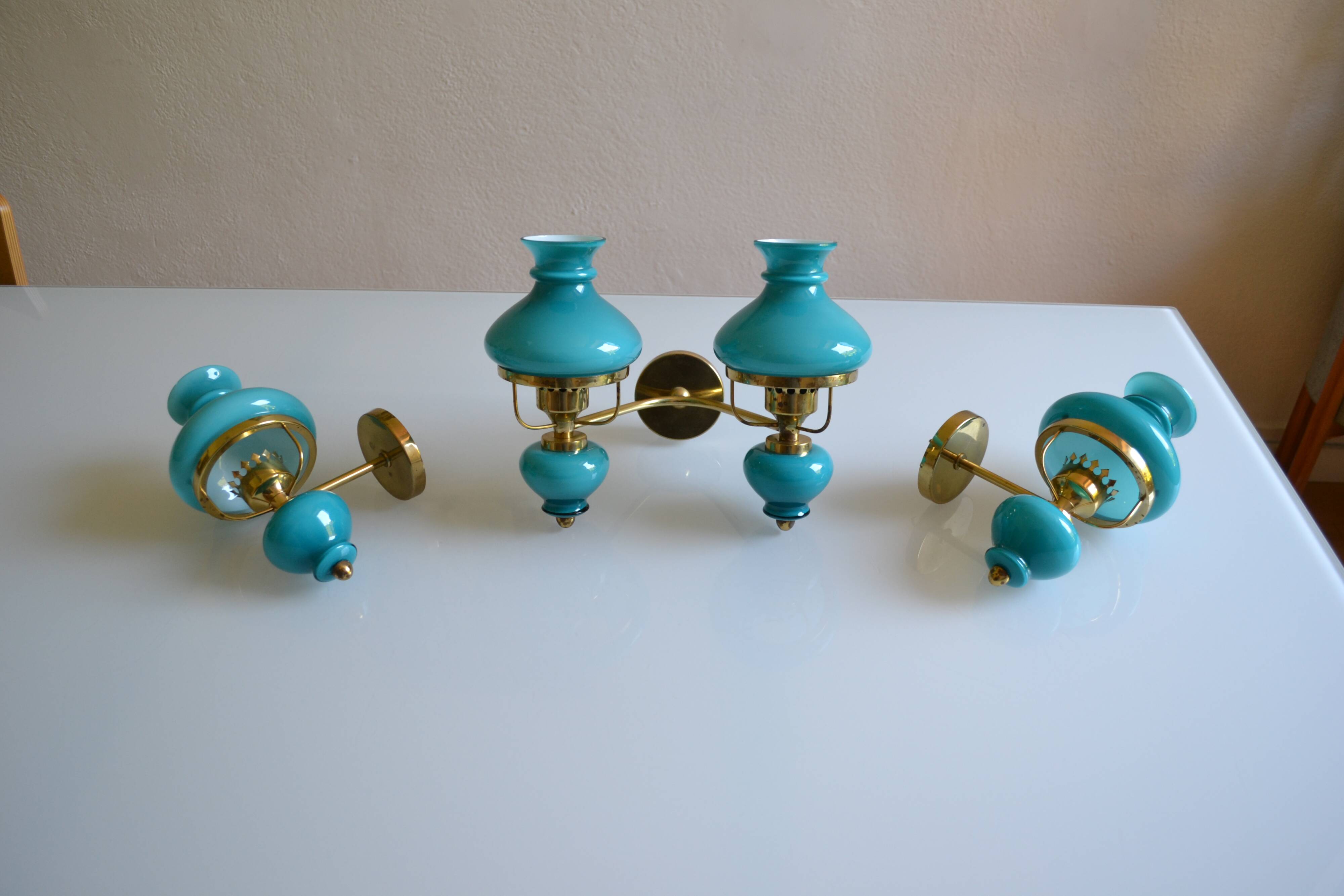 Series of 3 vintage brass and blue opaline wall lamps