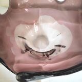 Crystal vase in the shape of a jellyfish, eggplant color with a gradient background