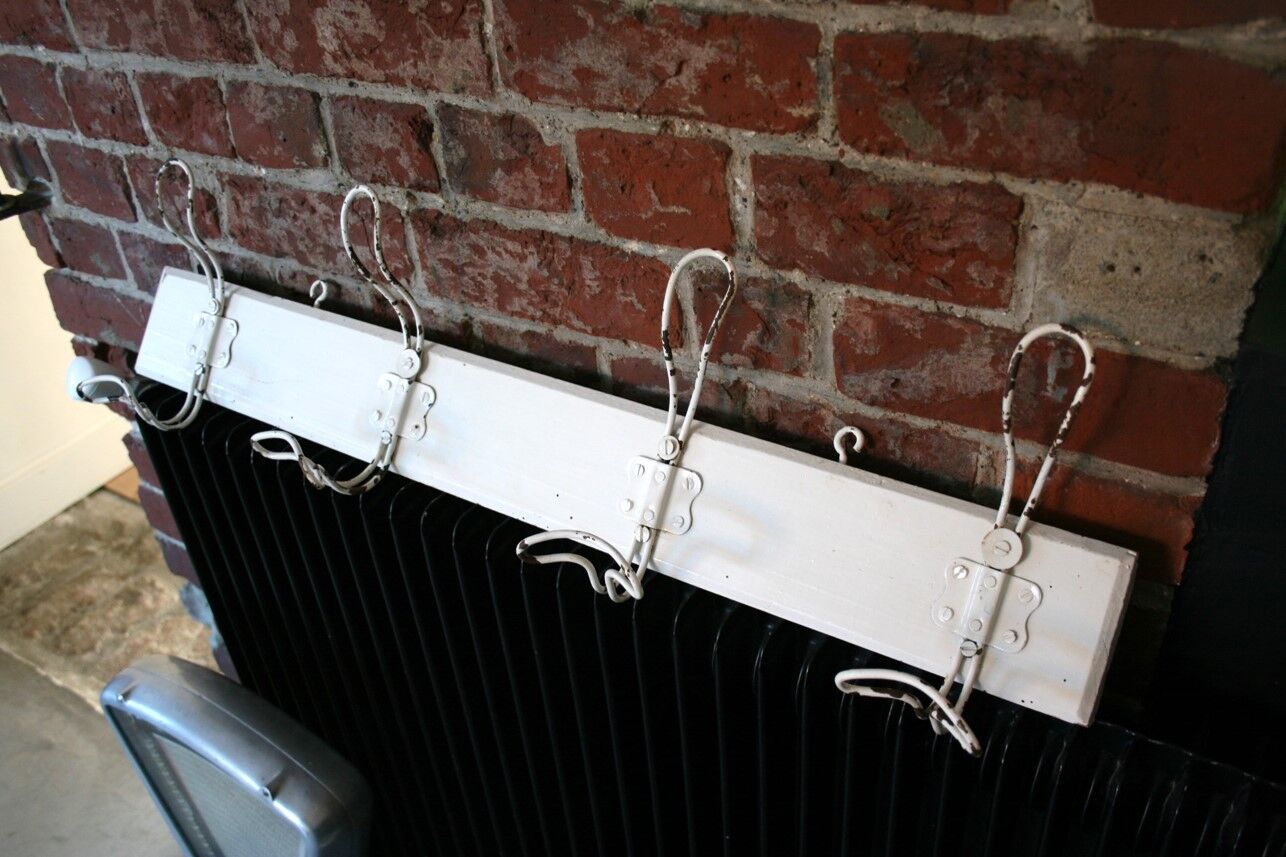 Metal and wood wall coat rack