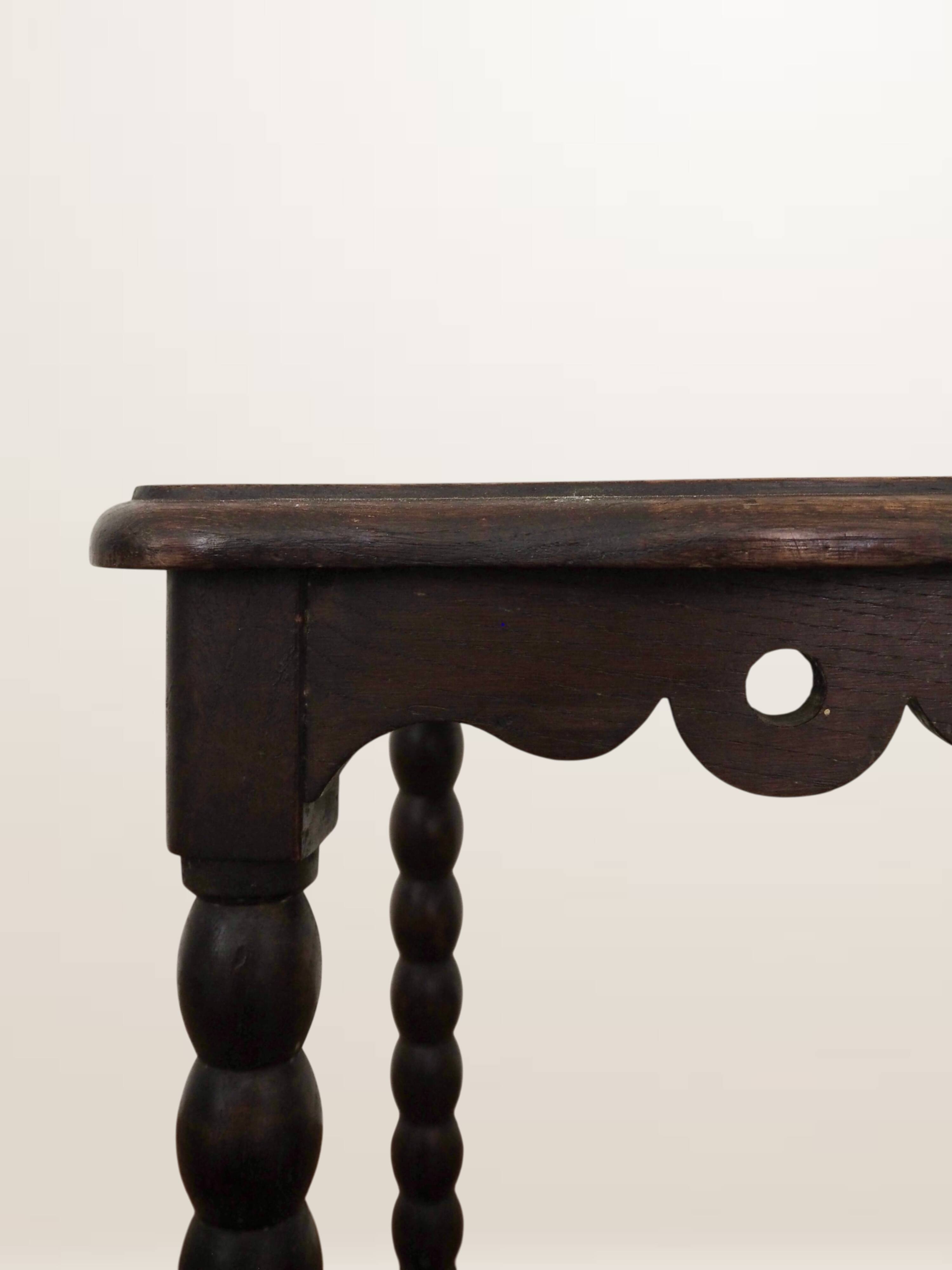 Oak stool with beaded spool legs