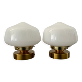 Pair of new electrified white opaline globe sconces