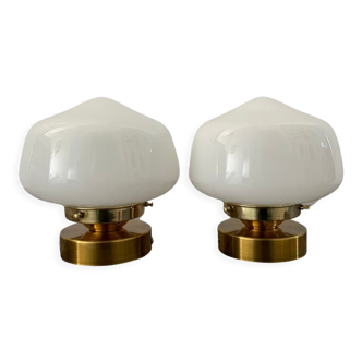Pair of new electrified white opaline globe sconces