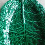 Large dish in green cabbage leaf slip