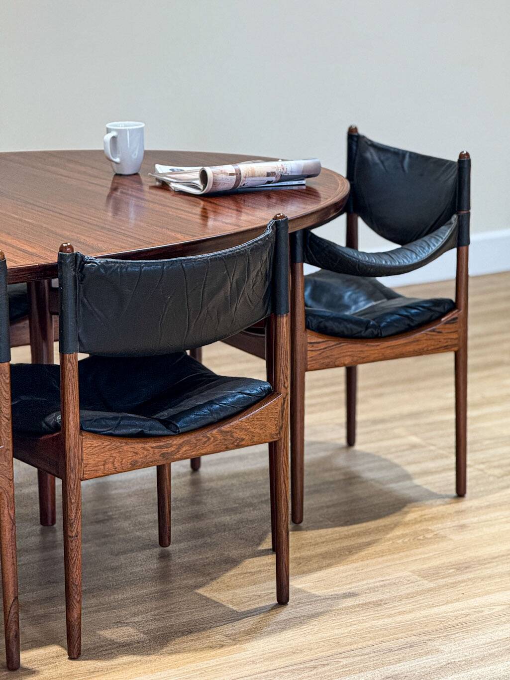 Extendable dining room table and chairs (by Kristian Solmer Vedel)