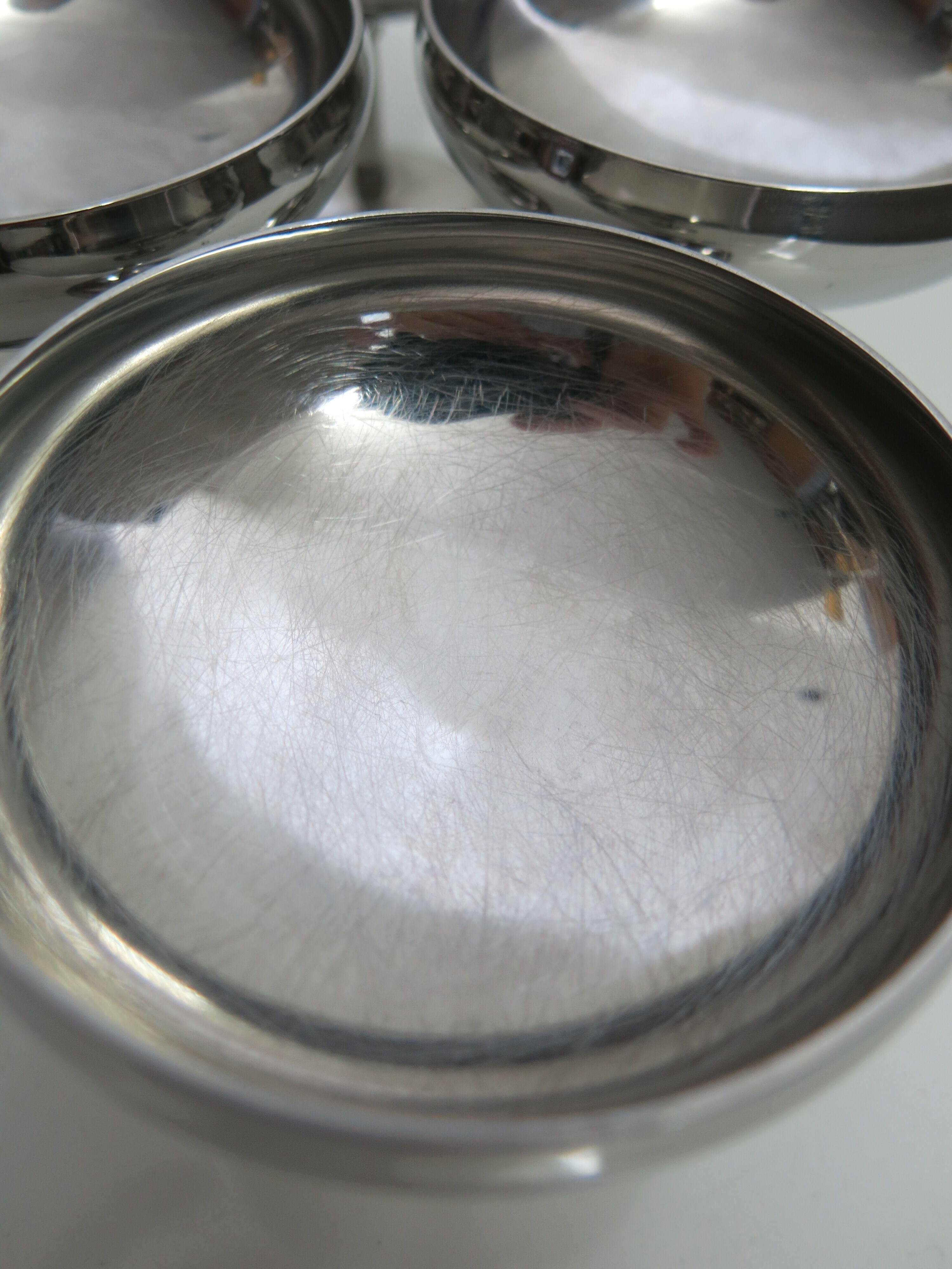 Set of six stainless steel cups from Letang-Rémy