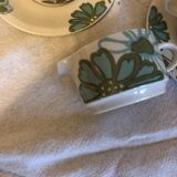 10 cups and saucers and 1 milk jug