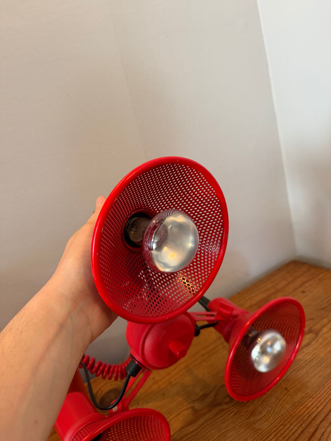 Three-lamp suspension in Memphis design style in red metal.