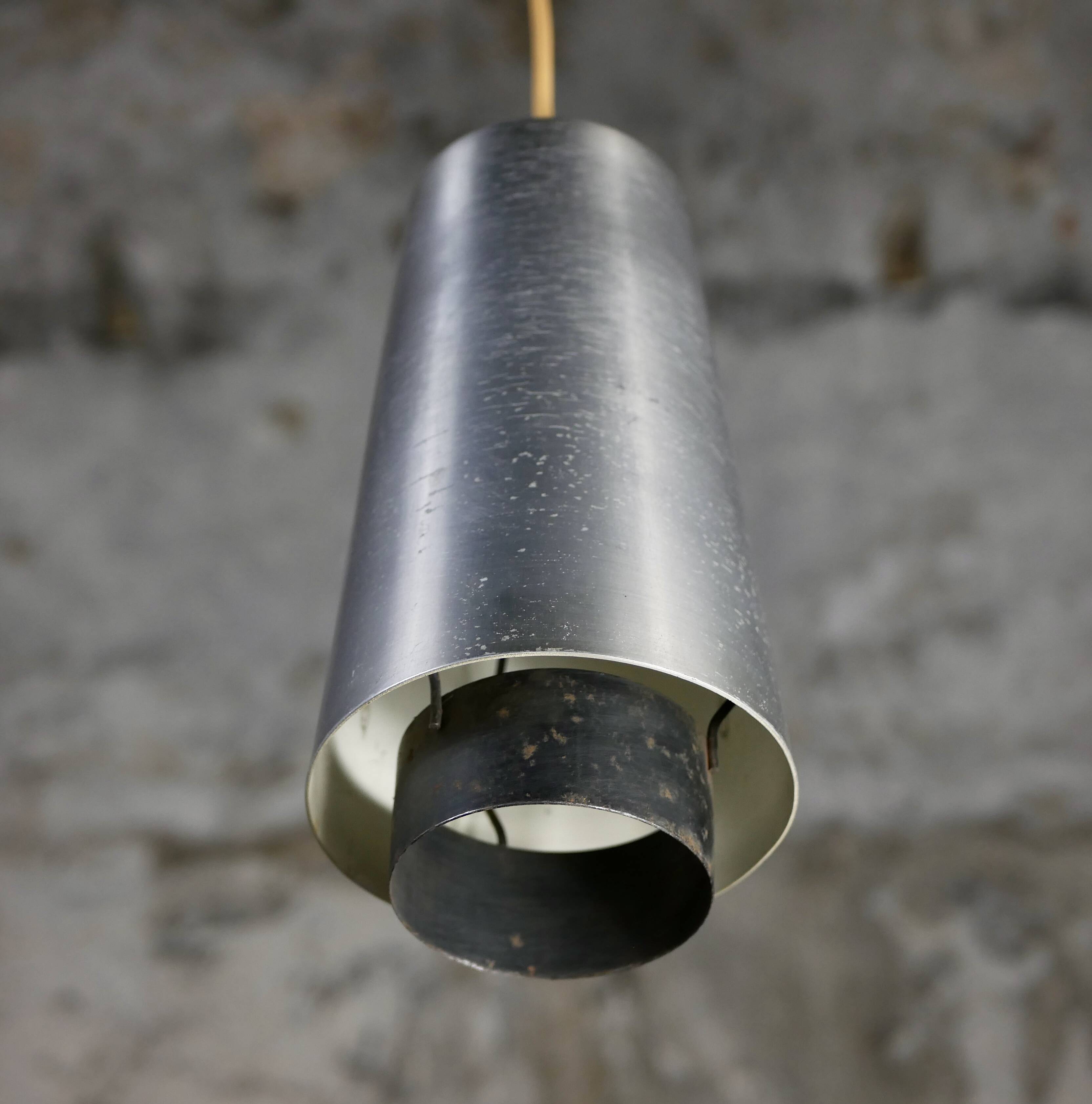 Trio of Raak steel pendant lights, 1960s