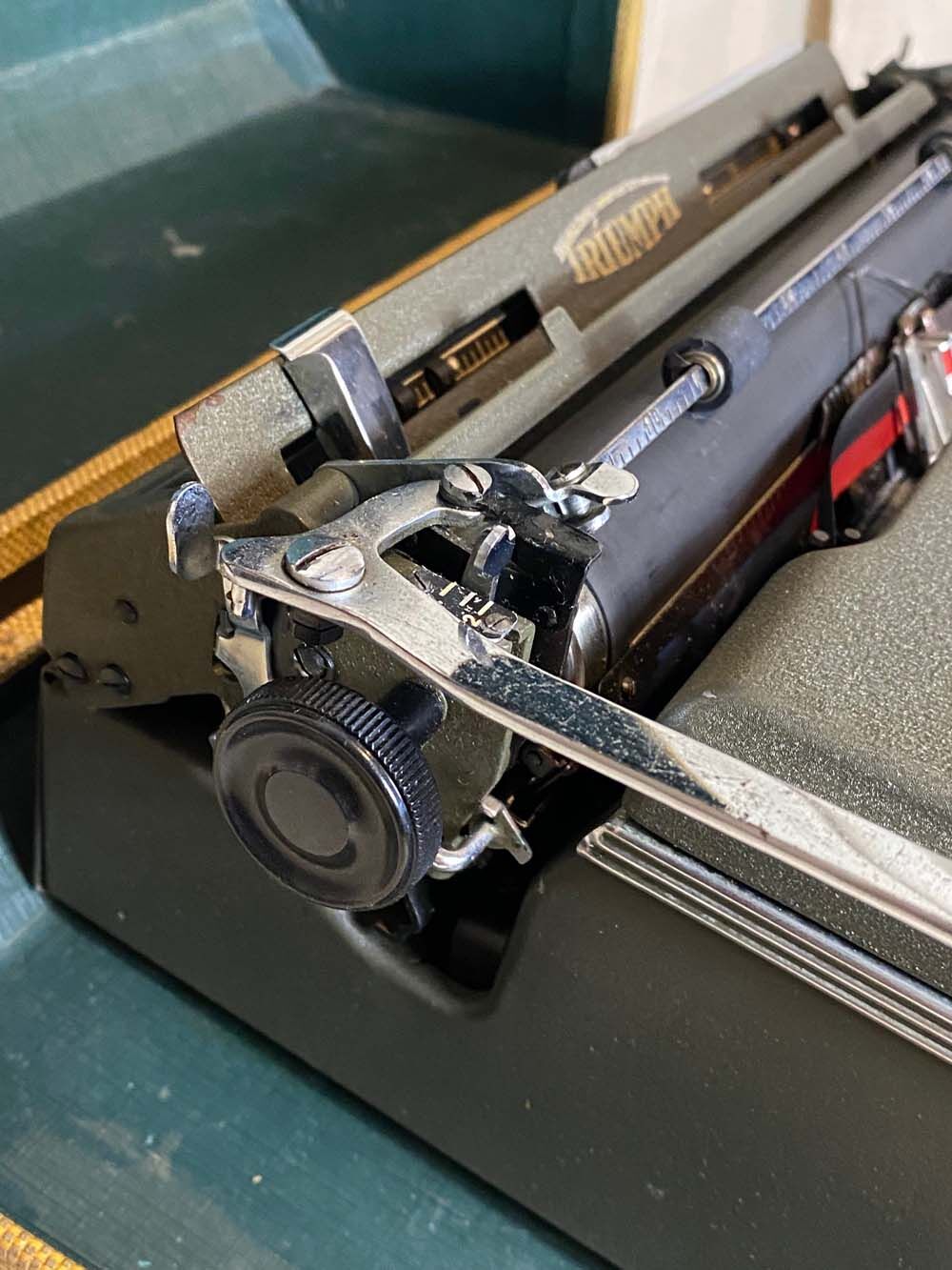 Triumph perfekt typewriter with its transport box.