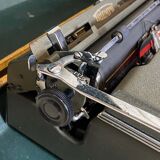 Triumph perfekt typewriter with its transport box.
