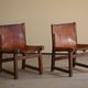 Paco Muñoz, Pair of lounge hunting armchairs, model "Riaza", leather and walnut, 1960