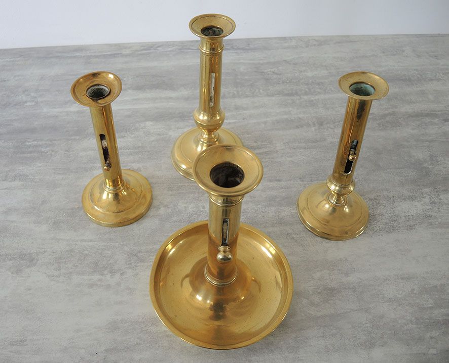 Set of 4 Old Brass Pusher Candle holders