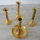 Set of 4 Old Brass Pusher Candle holders