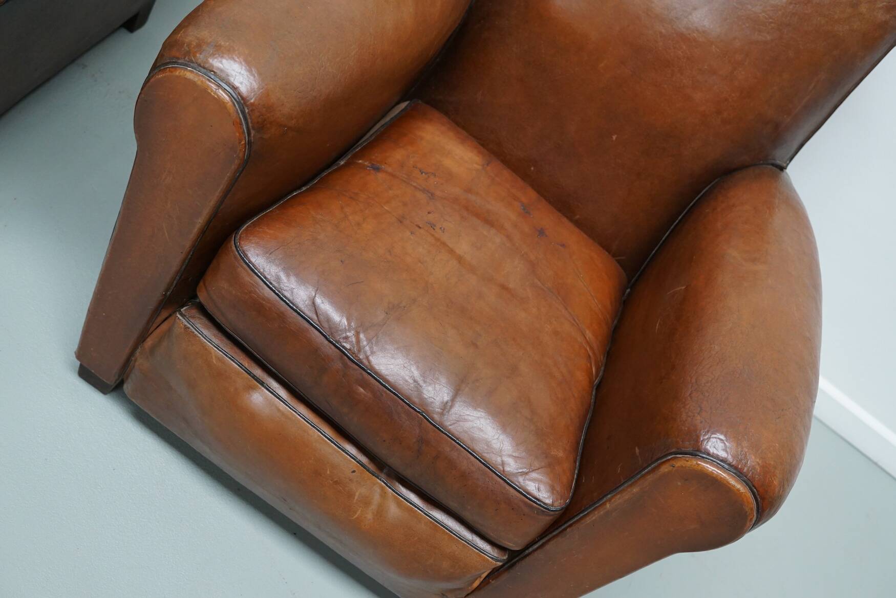 Pair of French Cognac Moustache Back Leather Club Chairs, 1940s