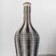 Vintage bottle in two-tone woven scoubidou.