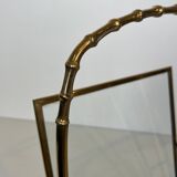 Bronze and brass faux-bamboo magazine rack by the Baguès house.