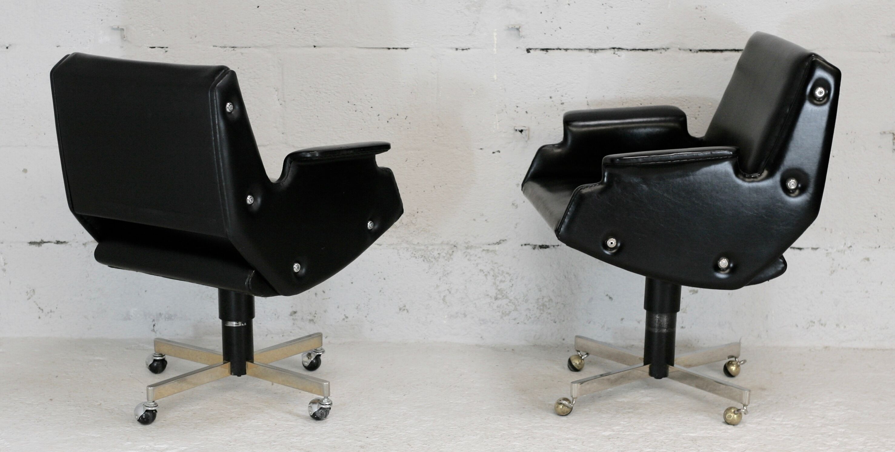 Pair of swivel armchairs, imitation leather and steel, Italy, circa 1960.