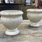 Pair of reconstituted stone planters from the 1970s.