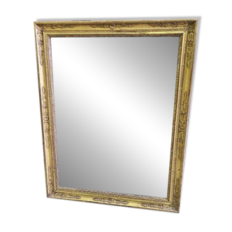 GOLDEN WOODEN MIRROR WITH PALMETTES FROM THE 19TH CENTURY