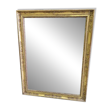 Miroir en bois dore a palmettes du XlX ème siecle