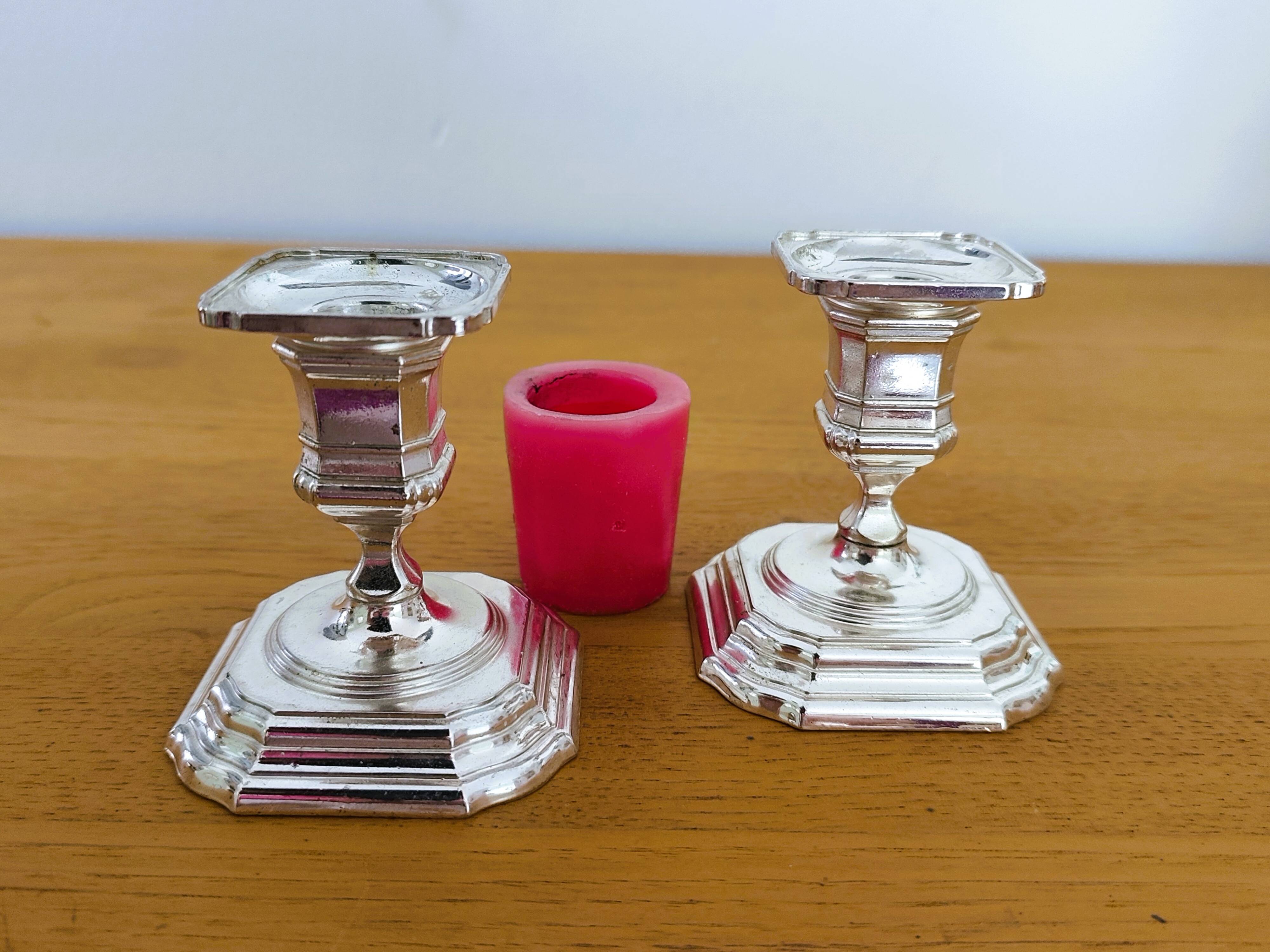 Pair of antique silver-plated candlesticks