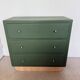 Vintage olive green chest of drawers with striped base