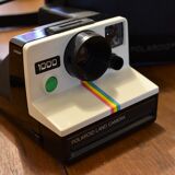Polaroid 1000 green button