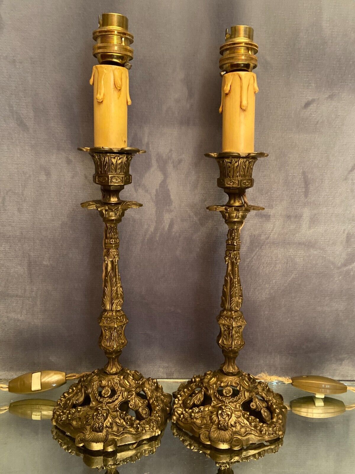 Pair of candlesticks mounted in late nineteenth century bronze lamp base Renaissance style